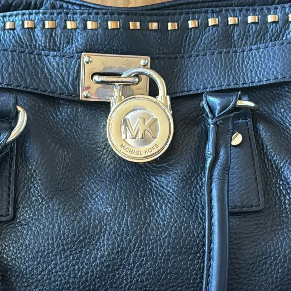 micheal kors black and gold stitched hamilton bag  with lock & key